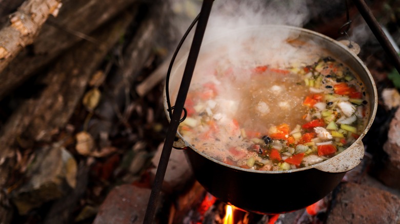 Pot of stew cooking on fire 