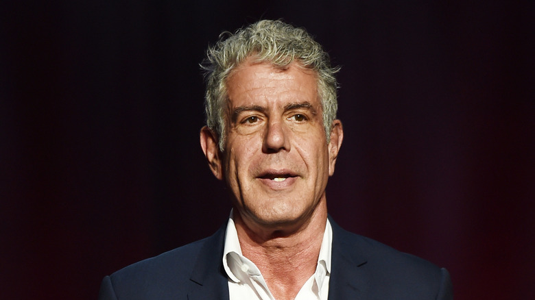 Anthony Bourdain speaking on stage
