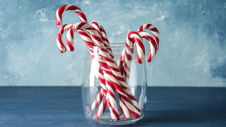 candy canes in glass jar