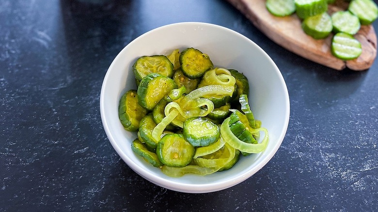 bread and butter pickles in a bowl 