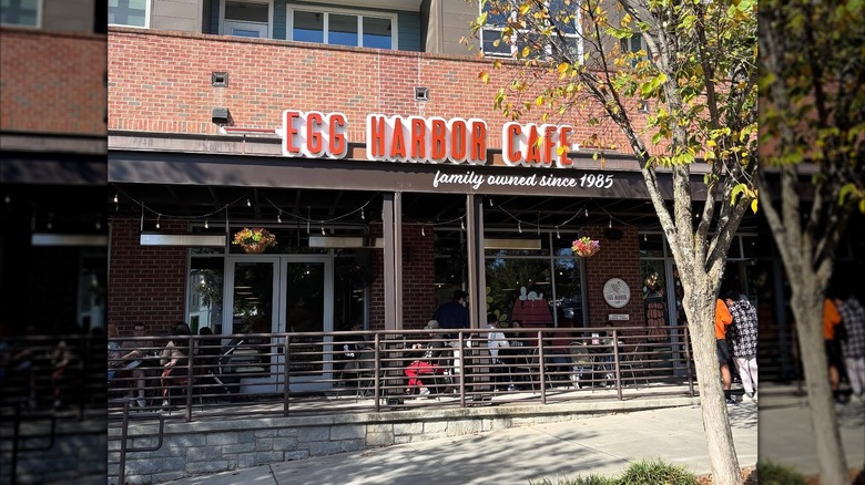 exterior entrance of Egg Harbor Cafe with outdoor patio dining area