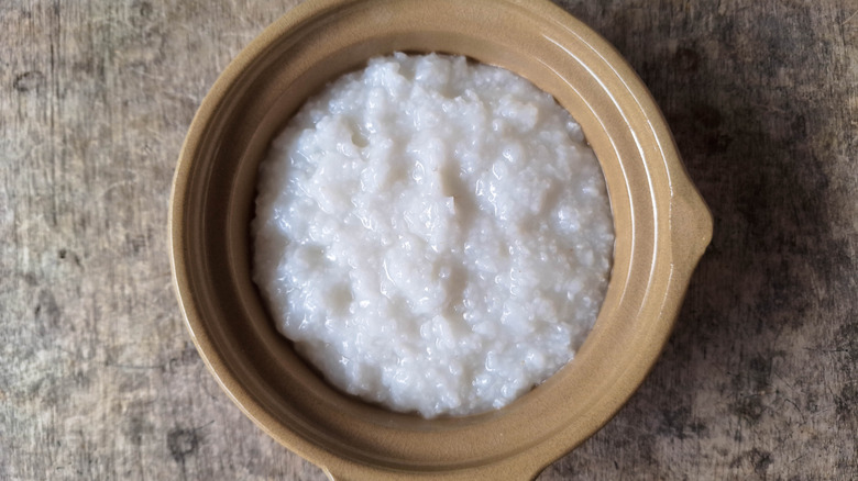 Brown crock of breakfast rice