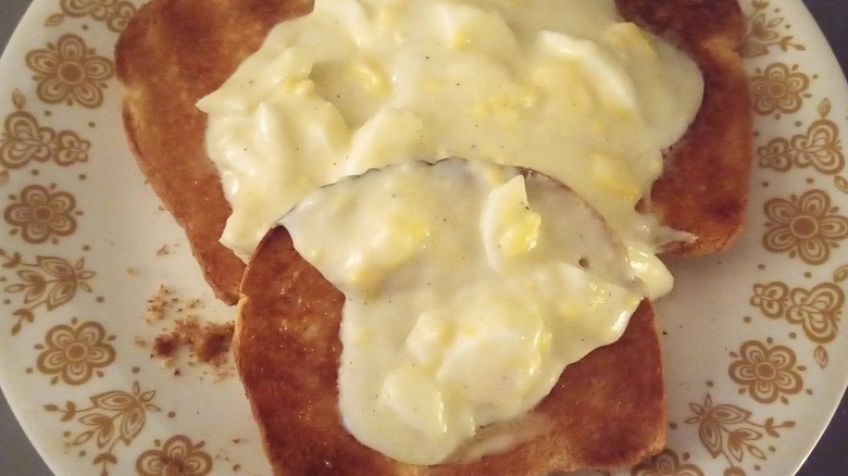 Creamed eggs on toast on a vintage plate