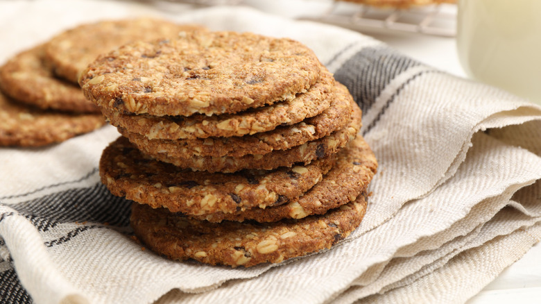 Thin oatmeal cookies on a vintage towel