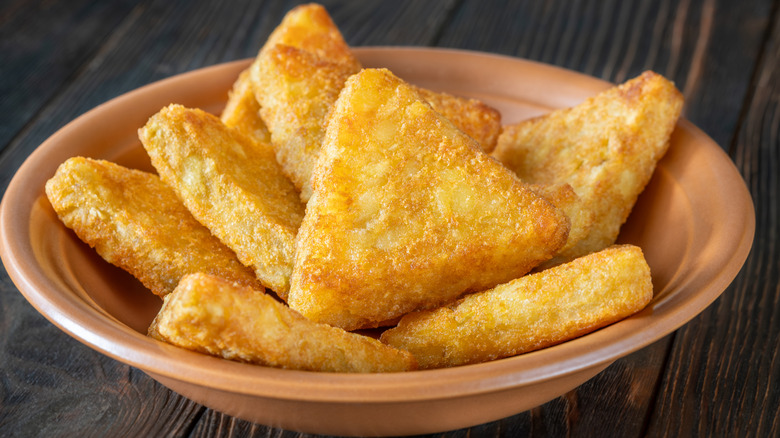 A bowl of hash brown patties