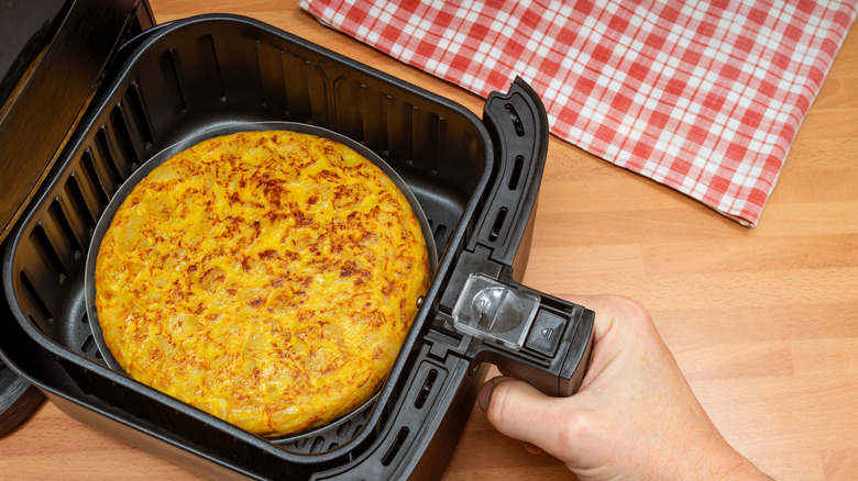 An air fryer pan with a homemade omelet