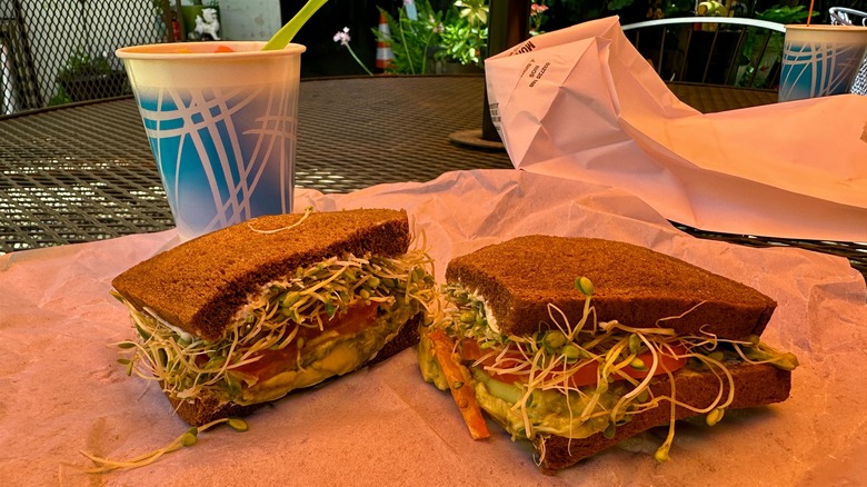 Sandwich and drink on outdoor table at Brighter Side in Modesto, California.