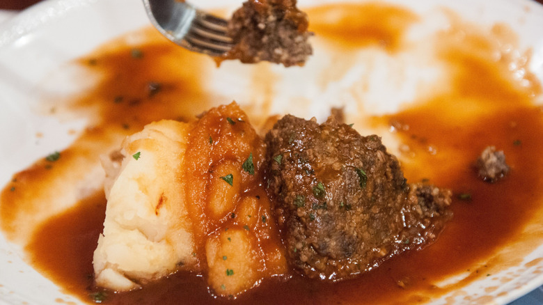 Haggis, neeps, and tatties on a plate