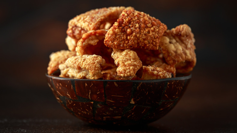 A bowl of pork scratchings