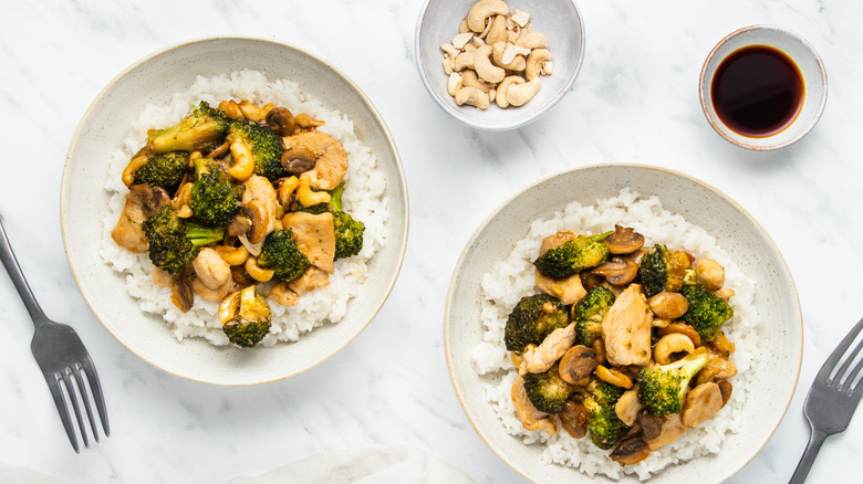 plates of chicken broccoli rice