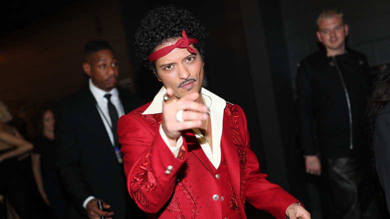 Bruno Mars in a red suit
