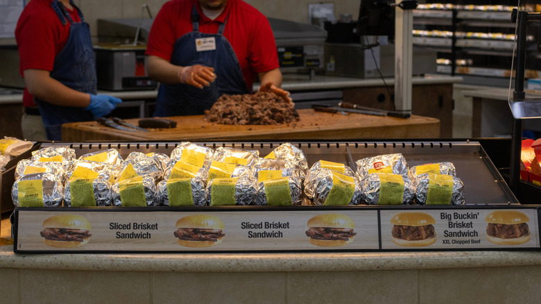 Buc-ee's smoked brisket on display for customers to quickly purchase hot sandwiches.