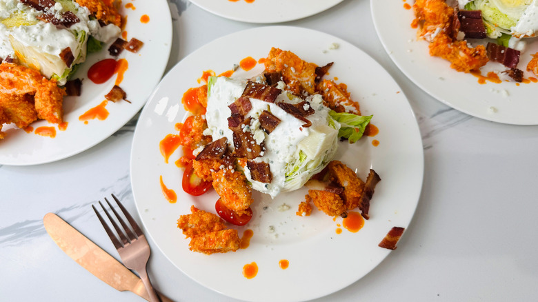 Buffalo chicken wedge salad on plate