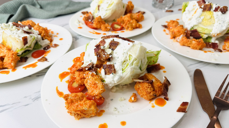 Buffalo chicken wedge salad on plate