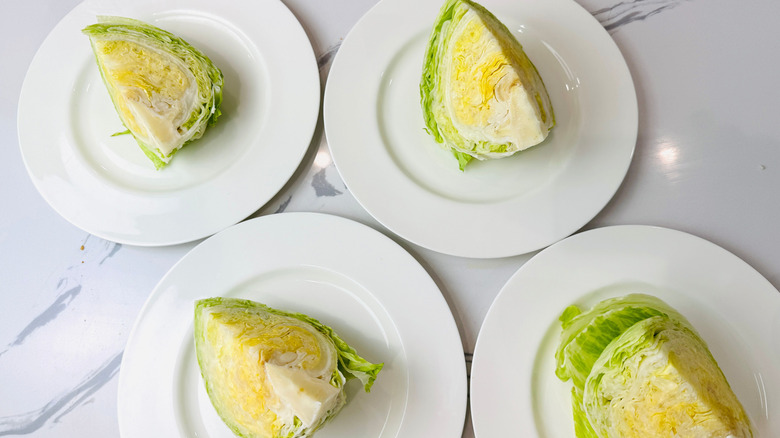 Iceberg lettuce wedges on plates