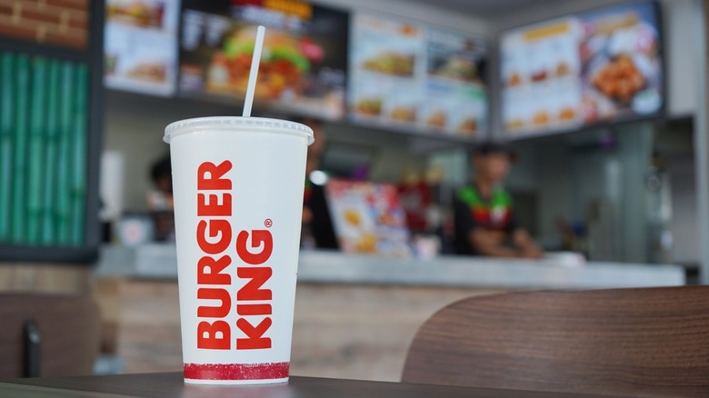 burger king cup on a table