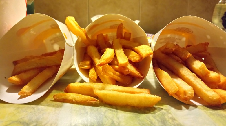 Three containers of french fries