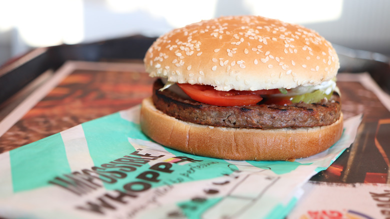 Impossible Whopper on blue striped paper wrapping