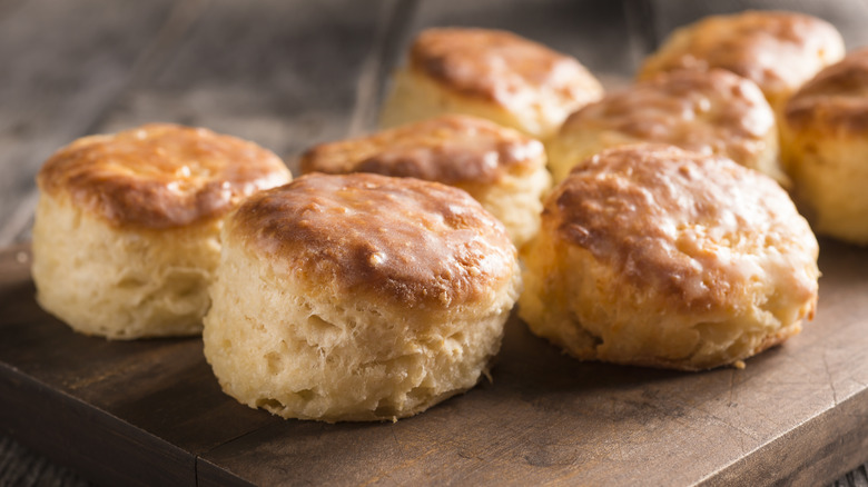 Browned biscuits on wooden board