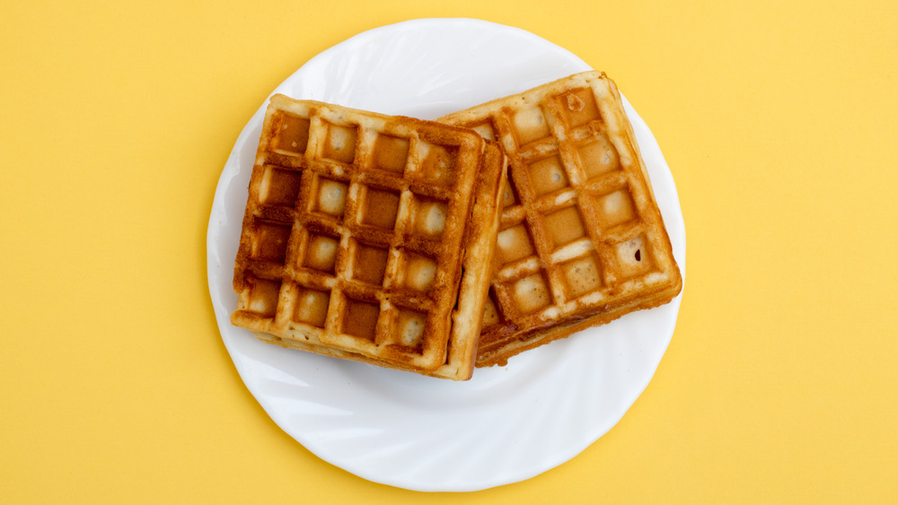 crisp waffles on a white plate