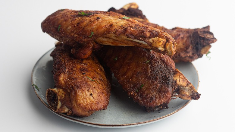 Fried turkey wings sitting on a plate