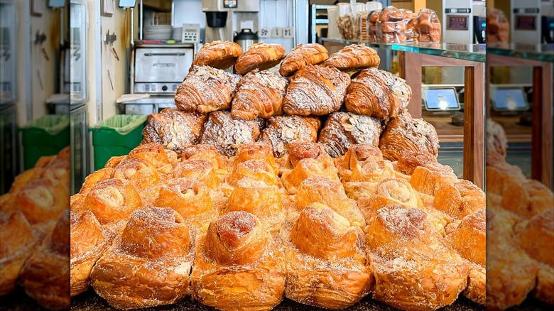 Stacks of morning buns and croissants at Tartine Bakery.