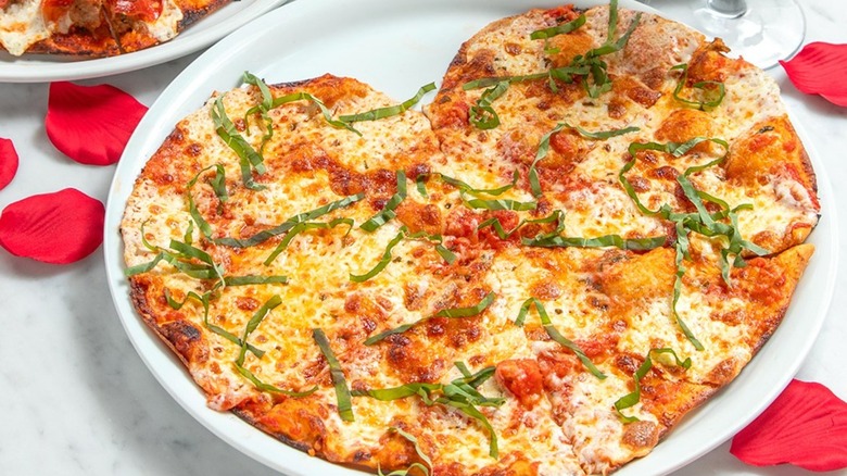 Heart-shaped cheese pizza