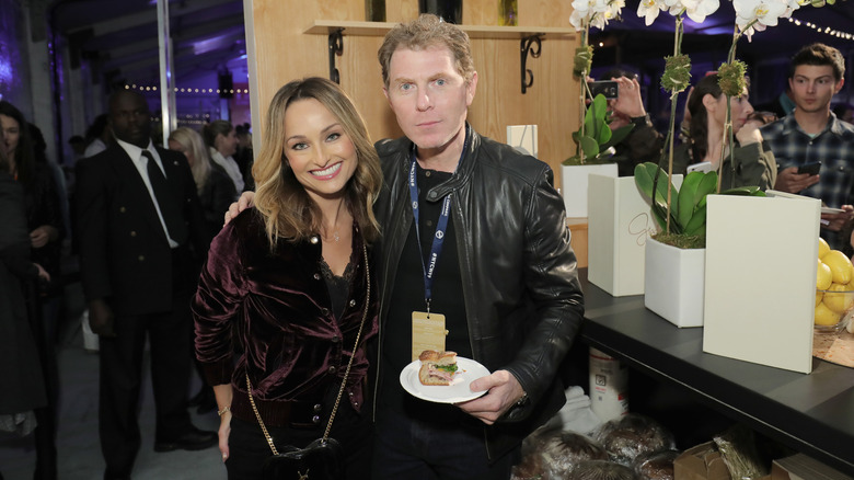 Giada De Laurentiis and Bobby Flay posing together