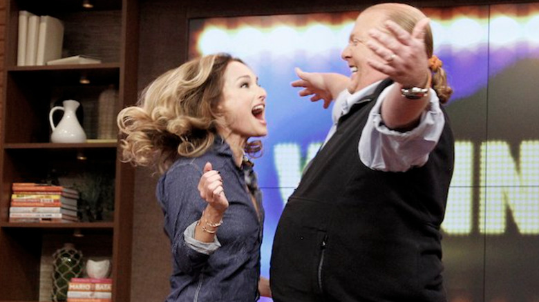 Giada De Laurentiis and Mario Barali celebrating