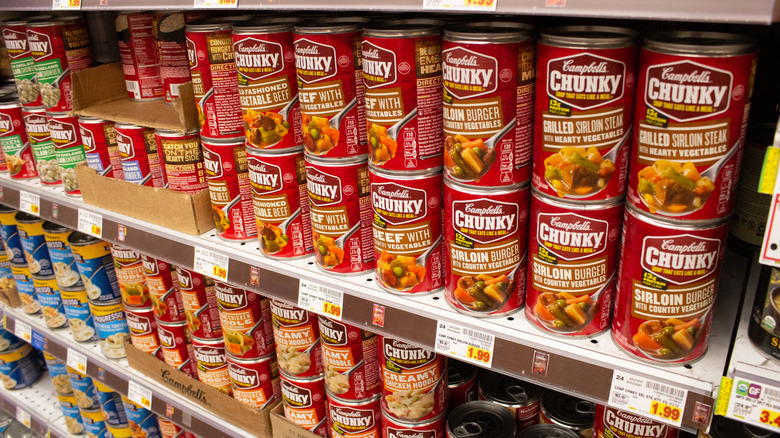Cans of Campbell's Chunky Soup on a store shelf