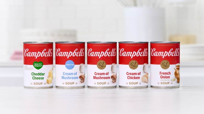 five Campbell's soup cans on a counter