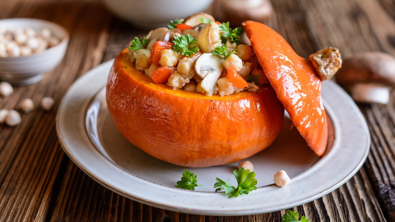 Roasted stuffed pumpkin on plate