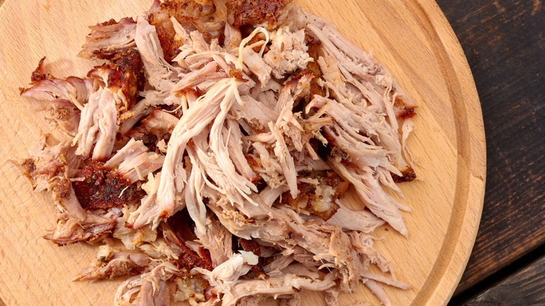 pulled pork on wooden board