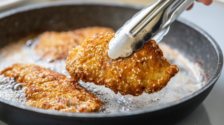 cooking fried chicken