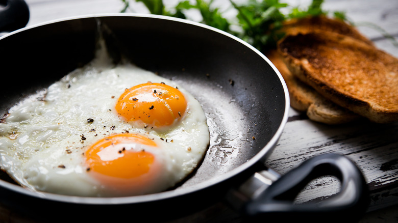 fried eggs in pan