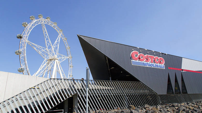 Exterior of Costco in Melbourne, Australia with a ferris wheel nearby.