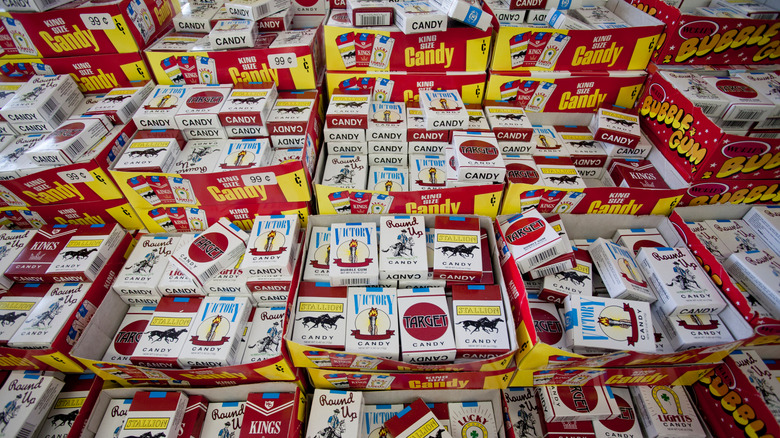 A pile of candy cigarette cartons