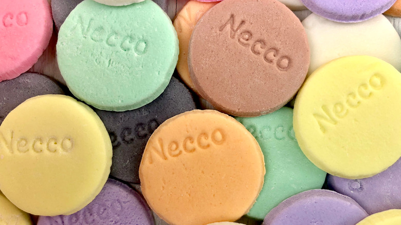 Colorful unwrapped Necco Wafers in pile