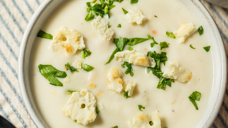 Bowl of New England Clam Chowder with saltine crackers