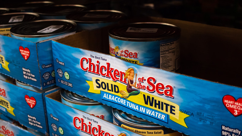 Cans of Chicken of the Sea tuna on Costco shelf