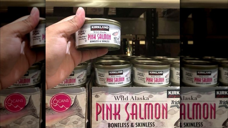 hand holding Kirkland Salmon
