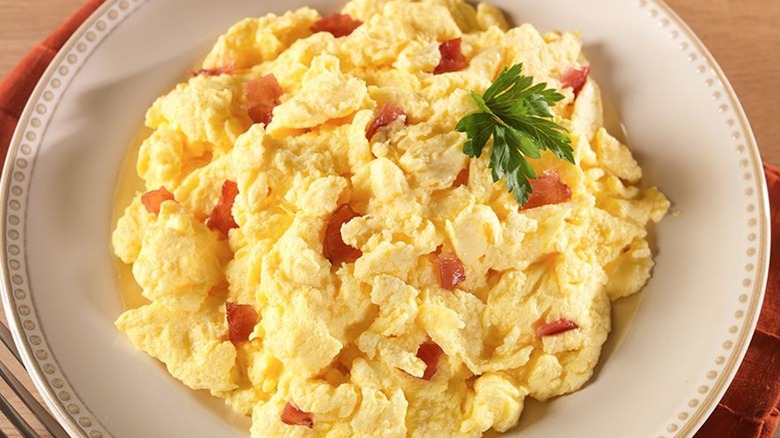 scrambled eggs in white bowl