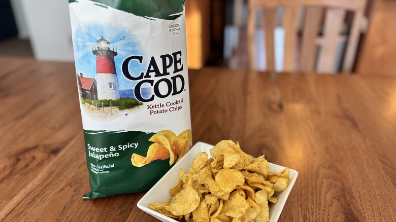 bag of jalapeno chips next to a bowl of them