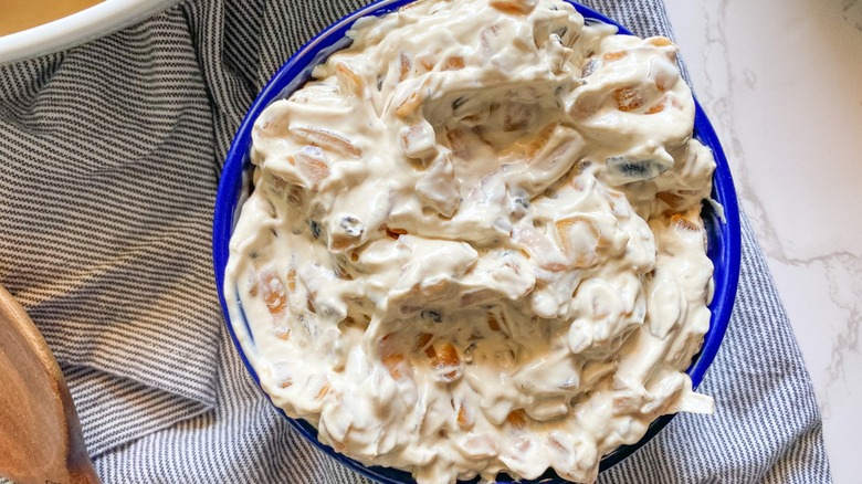 onion dip in blue bowl