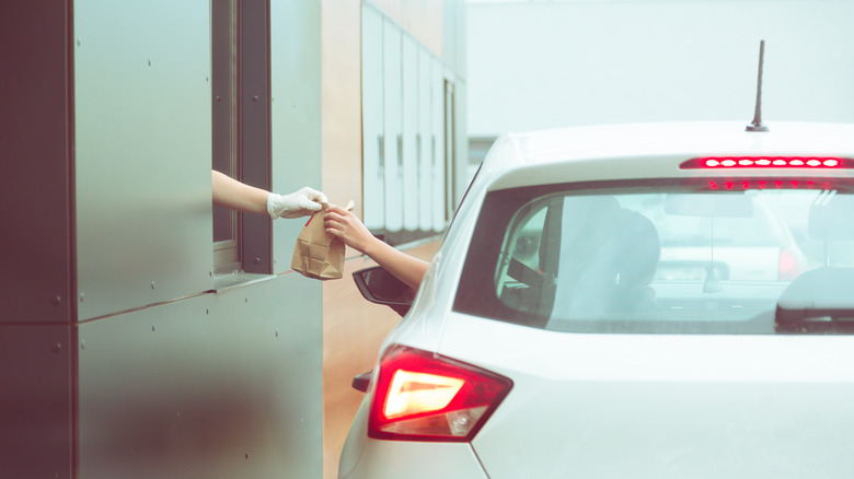 Person getting drive-thru food