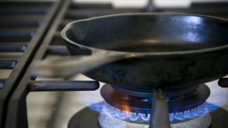 cast iron skillet on gas stove