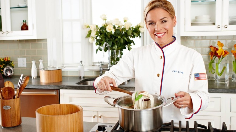Iron Chef Cat Cora in the kitchen