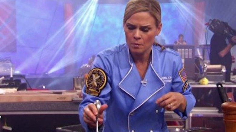 Cat Cora competes on Iron Chef America
