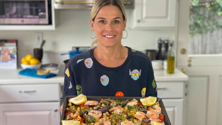 Cat Cora with sheet pan of shrimp