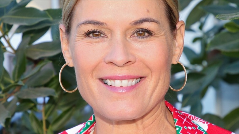cat cora slightly smiles